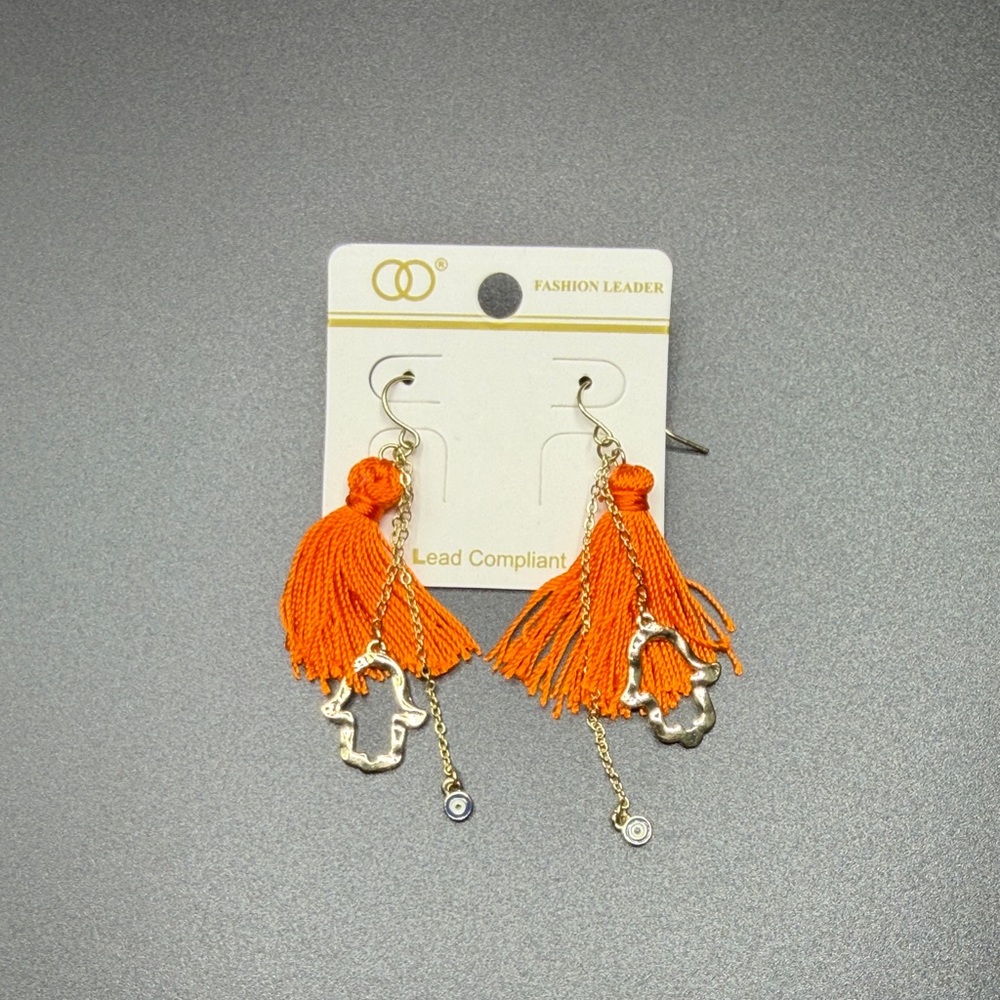 Orange Tassel Earrings with Gold Accents